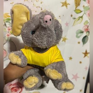 Charming Gray Elephant Toy with Yellow Accents